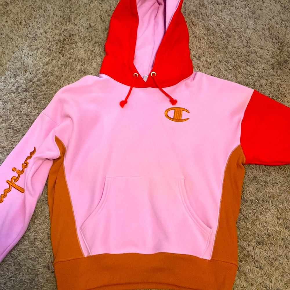 Pink, red, and tan Champion hoodie
